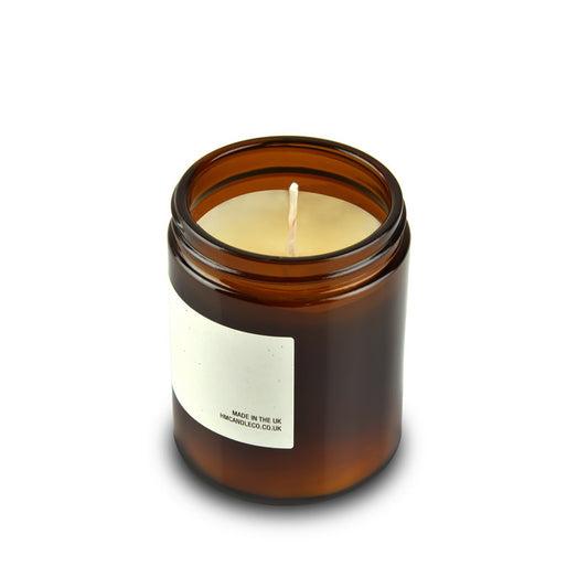 Amber & Musk Soy Wax Candle in a Recycled Amber Glass Jar. Handmade in Shropshire.