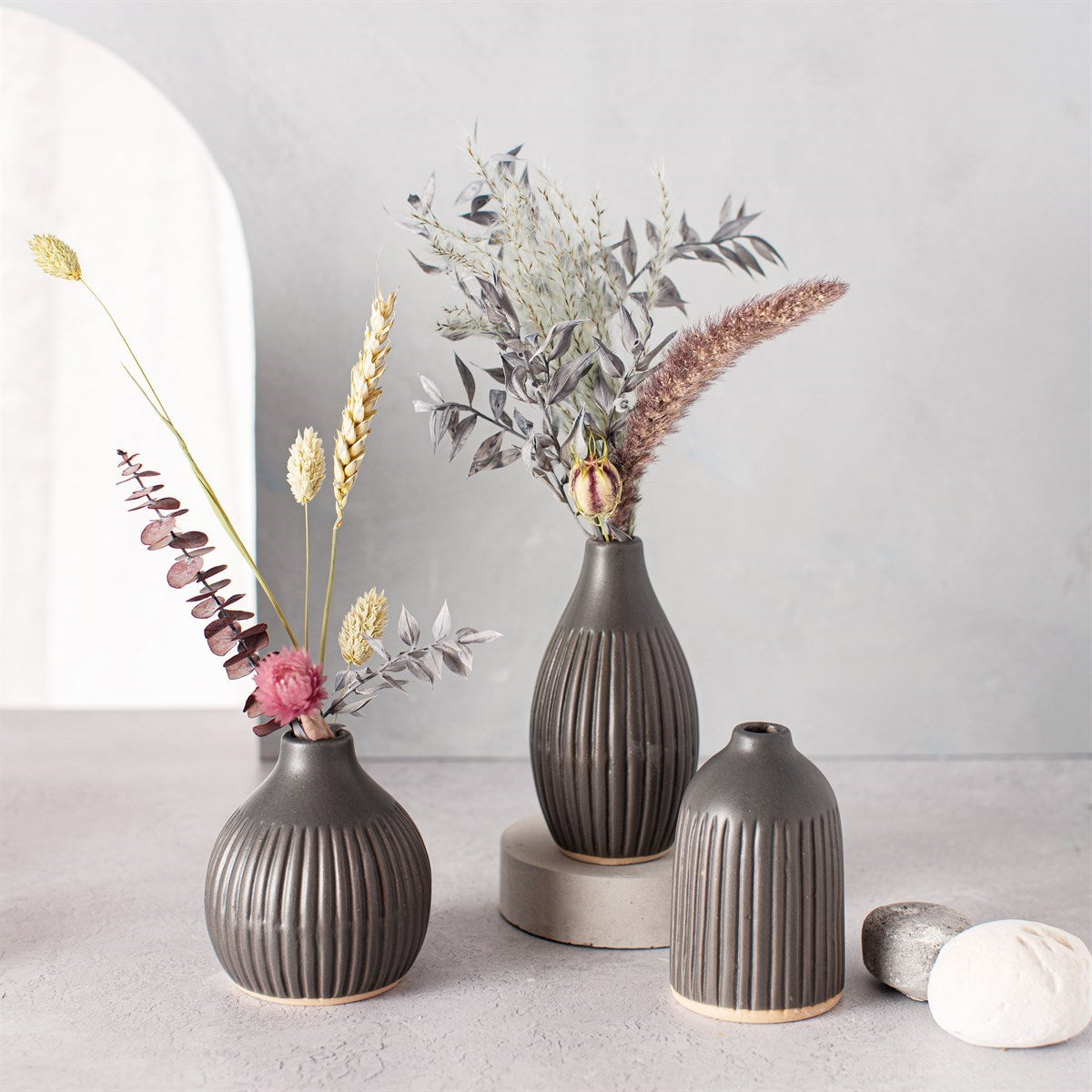 Black Grooved Bud Vases - Set Of 3 with dried flowers arranged